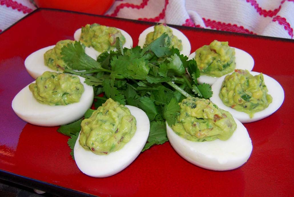 paleo recipe for guacamole deviled eggs from skinnytaste.com