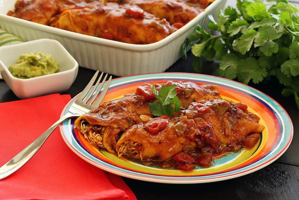 Slow cooker paleo and gluten free chicken enchiladas recipe from PaleoNewbie.com