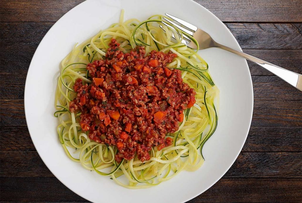 paleo spaghetti with zucchini noodles and bolognese sauce from paleonewbie.com