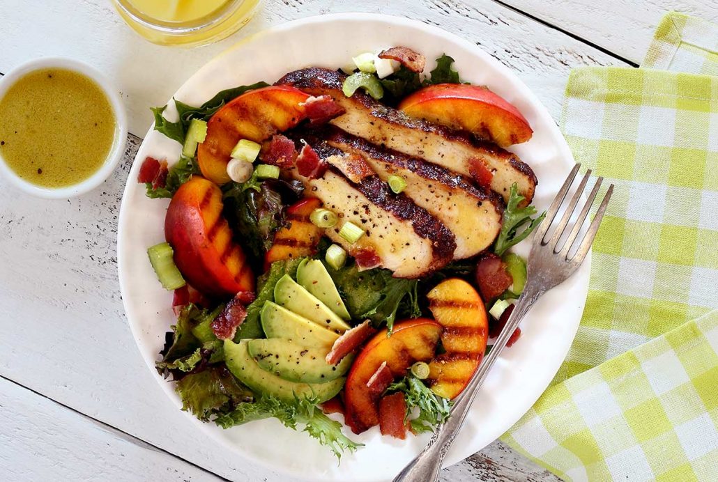 grilled chicken and peach salad with honey lime vinaigrette