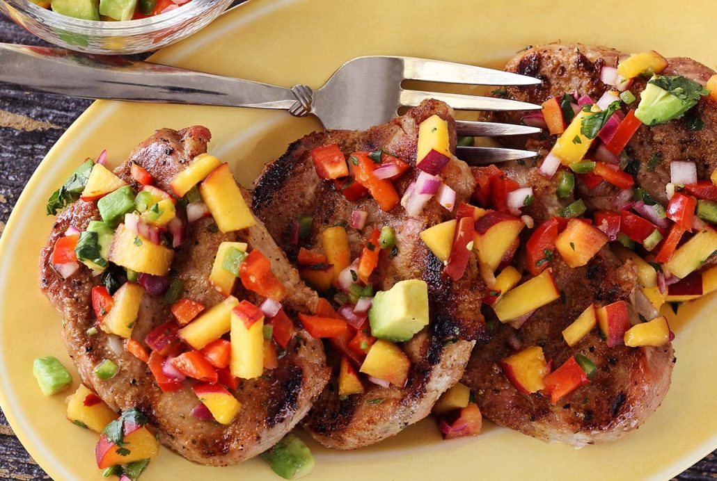 easy paleo recipe for grilled pork chops with a peach salsa