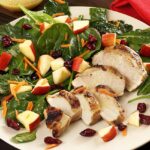 Easy paleo recipe for a kale, spinach and apple salad with a special lemon vinaigrette dressing