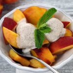 easy paleo recipe for a cream fruit topping made from coconut milk and spices