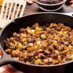 easy paleo and gluten-free hash recipe with sausage, potatoes and cranberries
